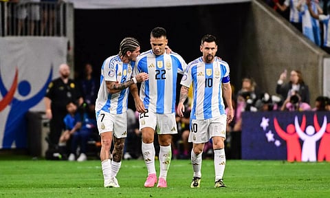 Rodrigo De Paul, Lautaro Martinez and Lionel Messi during the match against Ecuador