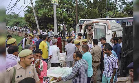 Victims's Bodies Of The Hathras' Stampede Being Carried, At Sikandra Rao In Hathras (PTI)
