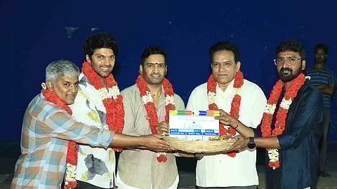 Arya, Santhanam and filmmaker Prem Anand during the pooja ceremony