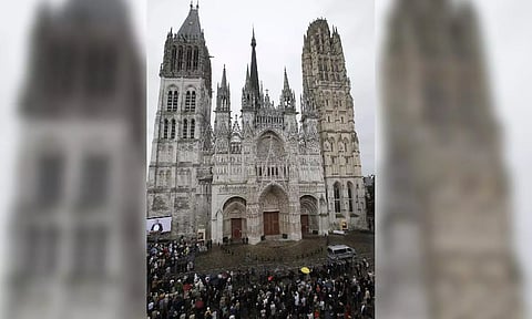 The crowd gather outside the Rouen cathedral,Normandry,during the funeral mass for Father Hamel (AP) 