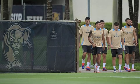 Argentina players arrive for a training session ahead of the final