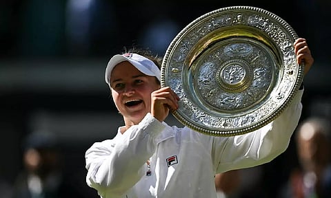 Barbora Krejcikova holds the winner's trophy