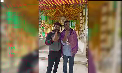 Raghava Lawrence with the art teacher from Kallakurichi (Photo: Screengrab)