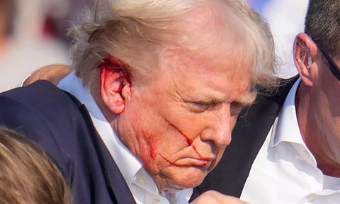 Donald Trump after the gunshot in his rally in Pittsburgh (PTI)
