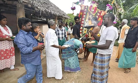 A Hindu family welcoming an ‘Allah Samy’ during Muharram in Kasavalavanadu Puthur village in Thanjavur on Wednesday