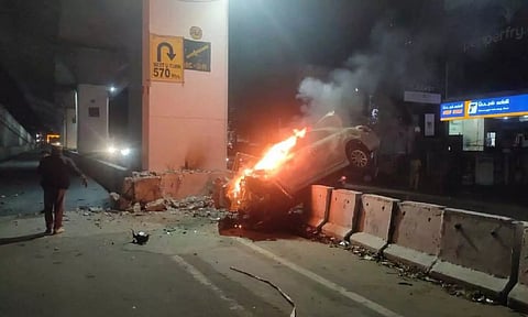 The car which went in flames following the mishap