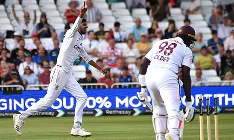 England's Shoaib Bashir, left, celebrates after dismissing after West Indies Jason Holder (PTI) 