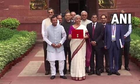 Finance Minister Nirmala Sitharaman reaches Ministry ahead of Union Budget presentation (ANI)