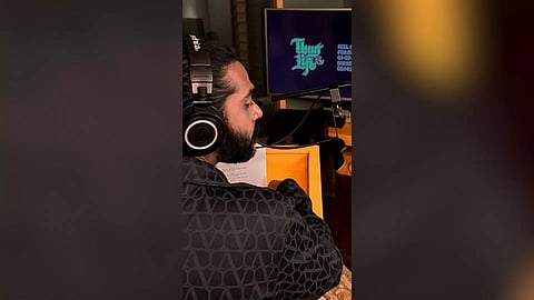 Still of Silambarasan TR dubbing (X/@RKFI)