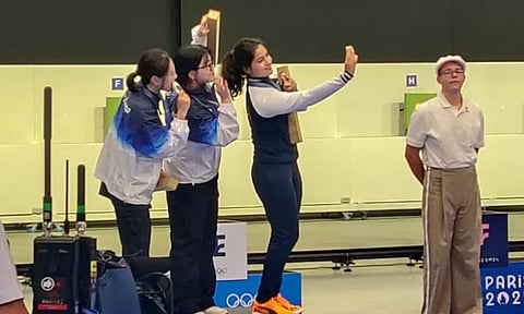 Gold Medallist Koreas Jin Ye Oh with her silver medallist compatriot Kim Yeji and bronze medallist India's Manu Bhaker during the presentation ceremony for the 10m Air Pistol Women's Final event (PTI)