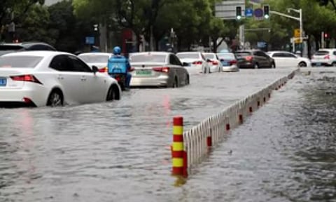China reports 7 more deaths from torrential rains brought by tropical storm, raising toll to 22