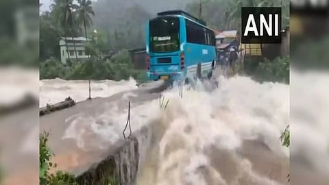 Canals overflowing, roads waterlogged, houses inundated in Kerala's Kozhikode as a result of heavy rainfall in the area (Photo/ANI)