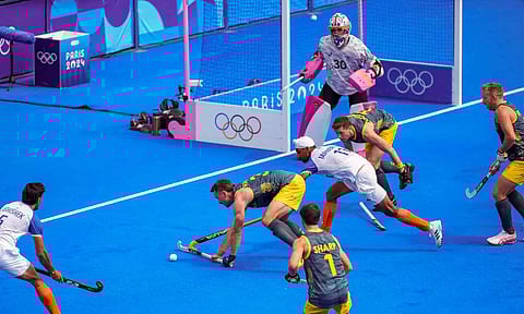  India's players during the Hockey Men's Pool B match between India and Australia (PTI)