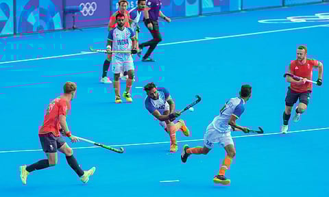 India's captain Harmanpreet Singh (13) in action during the Hockey Men's Quarterfinal match between India and Great Britain (PTI)