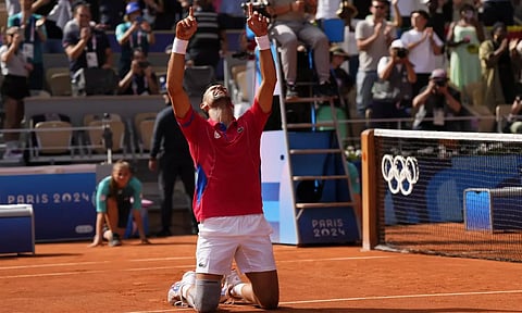 Serbia's Novak Djokovic reacts after defeating Spain's Carlos Alcaraz in the men's singles tennis final (AP) 