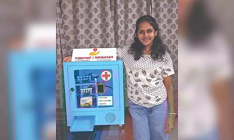 Mahashri with her medicine dispenser