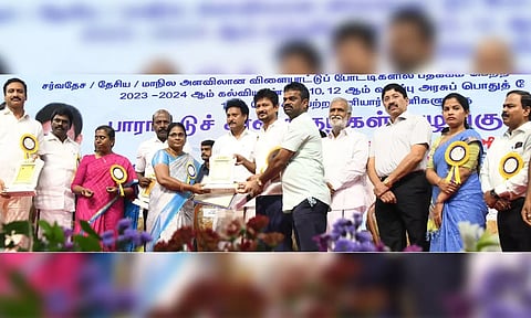 Ministers Udhayanidhi Stalin and Anbil Mahesh Poyyamozhi felicitating achievers from private schools in Chennai on Sunday 
