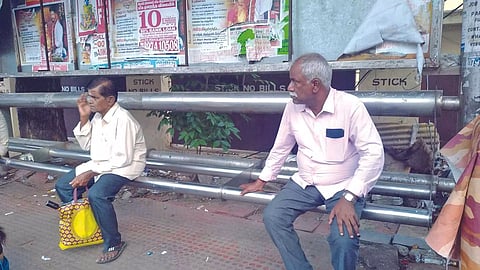  Broken seats at a bus shelter in Vepery