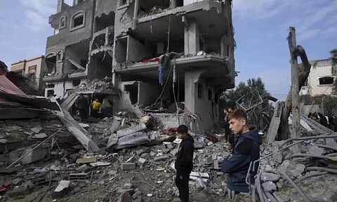 Rights group says Israeli forces killed 7 sheltering in a Gaza City home