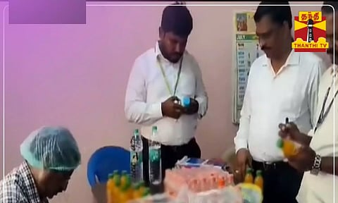 Officials examines the softdrinks (Thanthi TV)