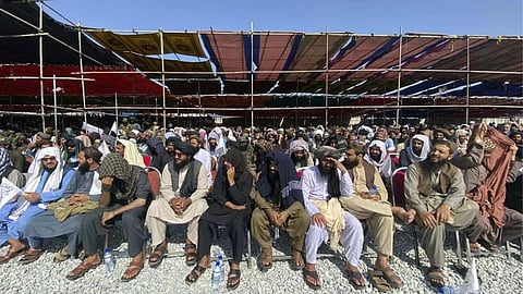 Afghan attend a ceremony to celebrate 3 years of withdrawal of US Troop