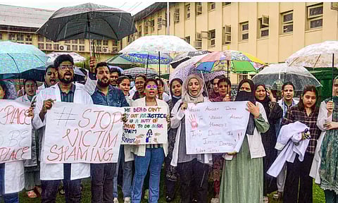 Doctors of Moti Lal Nehru Medical College stage a protest amid the 24-hour nationwide strike called by the Indian Medical Association (IMA) demanding justice for the woman doctor