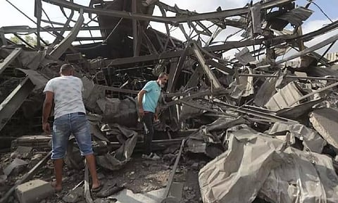 An Israeli strike in southern Lebanon early Saturday killed at least 10 Syrian nationals (AP)