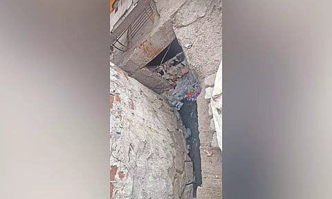 Open drain aside Nehru Bazar Street in Avadi