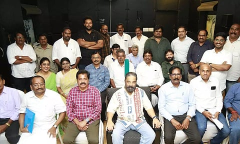 MNM founder president Kamal Haasan posing with party leaders after the executive and governing council meeting in Chennai on Friday