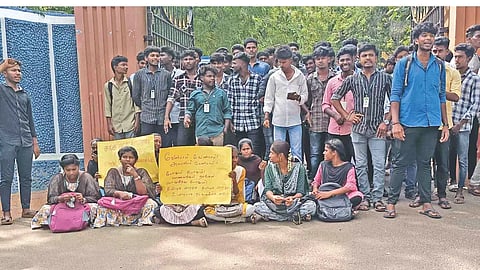 Students protesting in front of the college in Kumbakonam on Wednesday