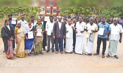 Farmers with compensation orders in Thanjavur on Thursday