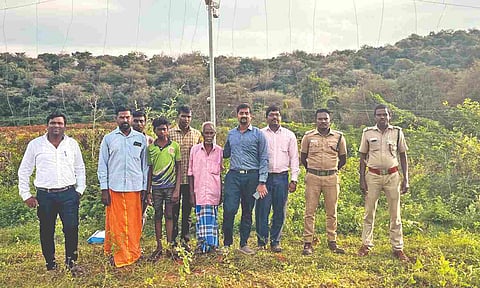 Officials and the villagers at Kammarapalyam location where AI-based intrusion detection system was installed