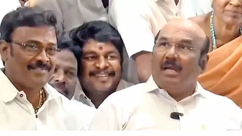 AIADMK leader D Jayakumar talking to reporters