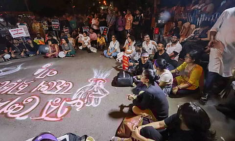 Actor Swastika Mukherjee with activists during an overnight sit-in dharna after a protest rally demanding justice for a trainee doctor who was raped-murdered at RG Kar Medical College and Hospital (PTI)