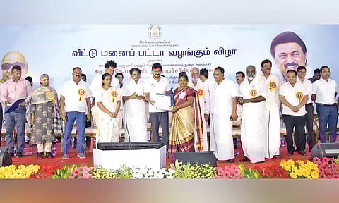 Sports Minister Udhayanidhi Stalin distributing patta