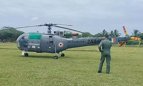 training helicopter lands in paddy field near Porpandal, a village in the Uttiramerur taluk