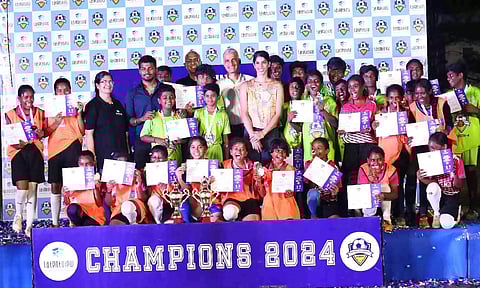Winners of the Chennai Kaalpandhu League- Season 4 pose with the trophy 
