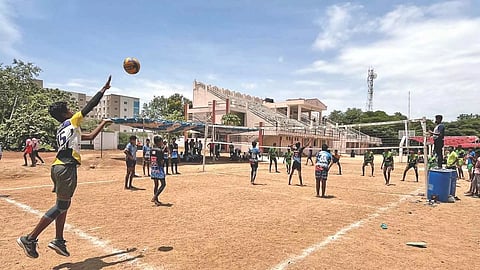 Students of a ADW school practising volleyball