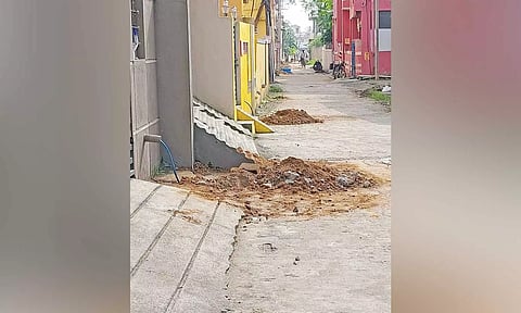 Drainage work left incomplete on a street in Gopalapuram in Pattabiram