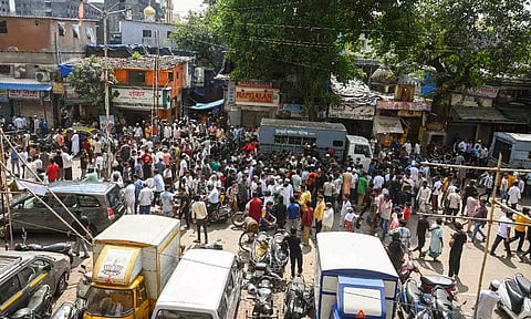  Muslim community people gather as BMC plans to demolish the illegal portion of a mosque