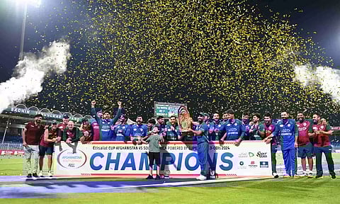 Afghanistan players pose with the trophy after ODI series triumph against South Africa (X/ACBofficials)