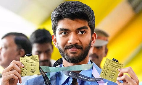  Chess Grandmaster D Gukesh being welcomed upon his arrival at the Chennai Airport (PTI)