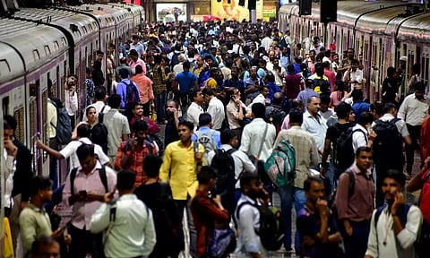  Commuters stranded at Chhatrapati Shivaji Terminus (CSMT) as local train services got delayed due to rain