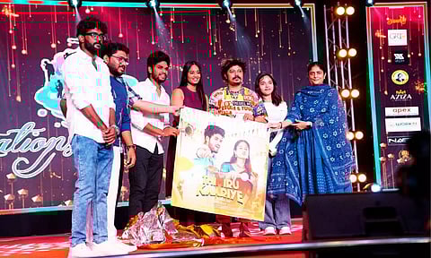 Sudha Kongara with the team of Thimirukaariye during the release of the song