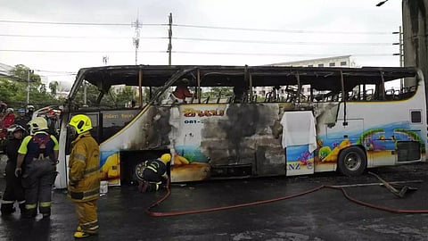 The destroyed bus in Bangkok (AP)