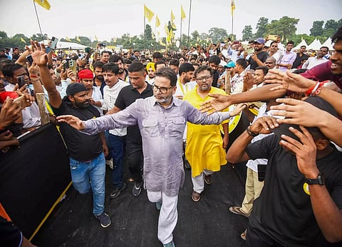 Jan Suraaj founder Prashant Kishor being garlanded by supporters during the formal launch of his new political party as Jan Suraaj Party at Veterinary College grounds, in Patna