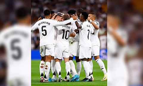Real Madrid players celebrate after scoring a goal (IANS)