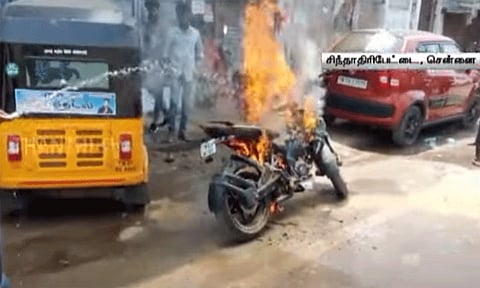 Two-wheeler catches fire in Chintadripet traffic after IAF air show