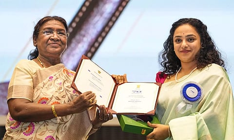  President Droupadi Murmu presents the 'Best Actress award to Nithya Menen (PTI)
