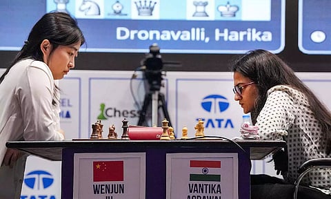  Women's World Chess Champion Wenjun Ju (L) of China and Vantika Agarwal of India during their women's rapid event match